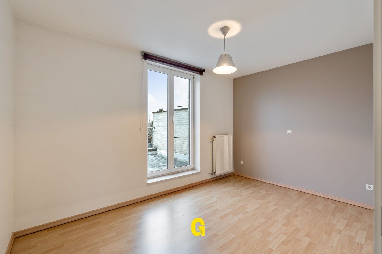 Degelijke instapklare rijwoning met drie slaapkamers, inpandige garage en tuin met terras vlakbij het centrum van Bilzen foto 19