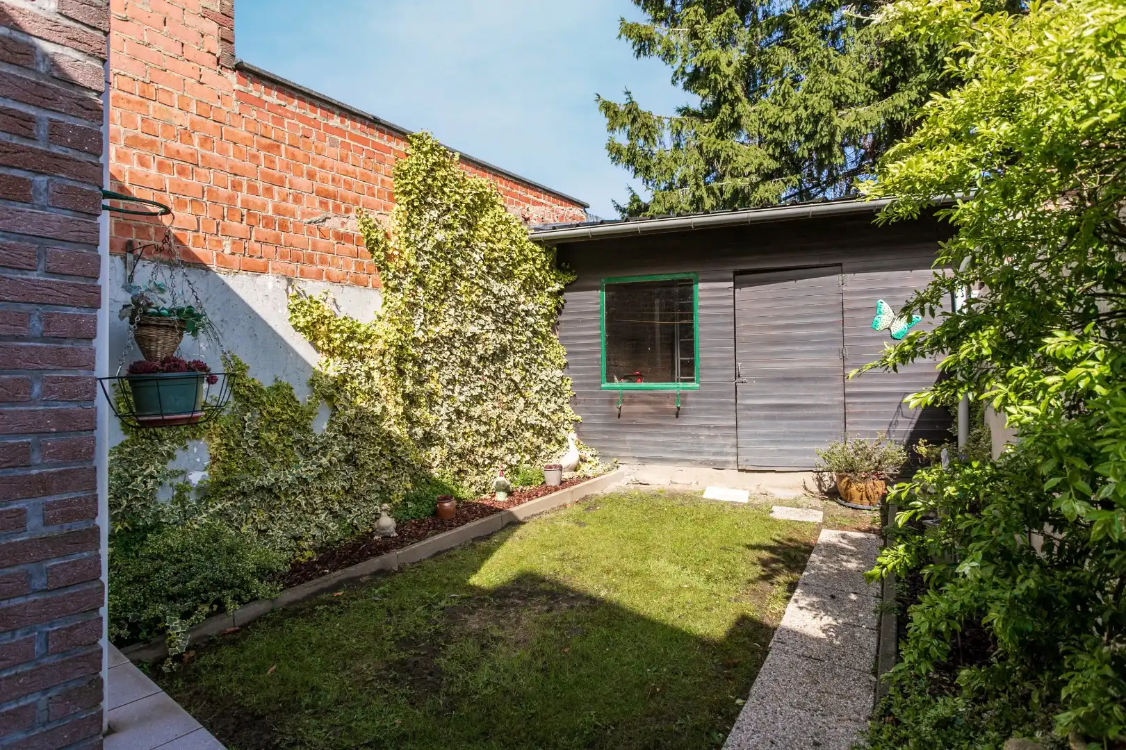 Verzorgde woning met 3 slaapkamers en leuke tuin te Halle foto 11