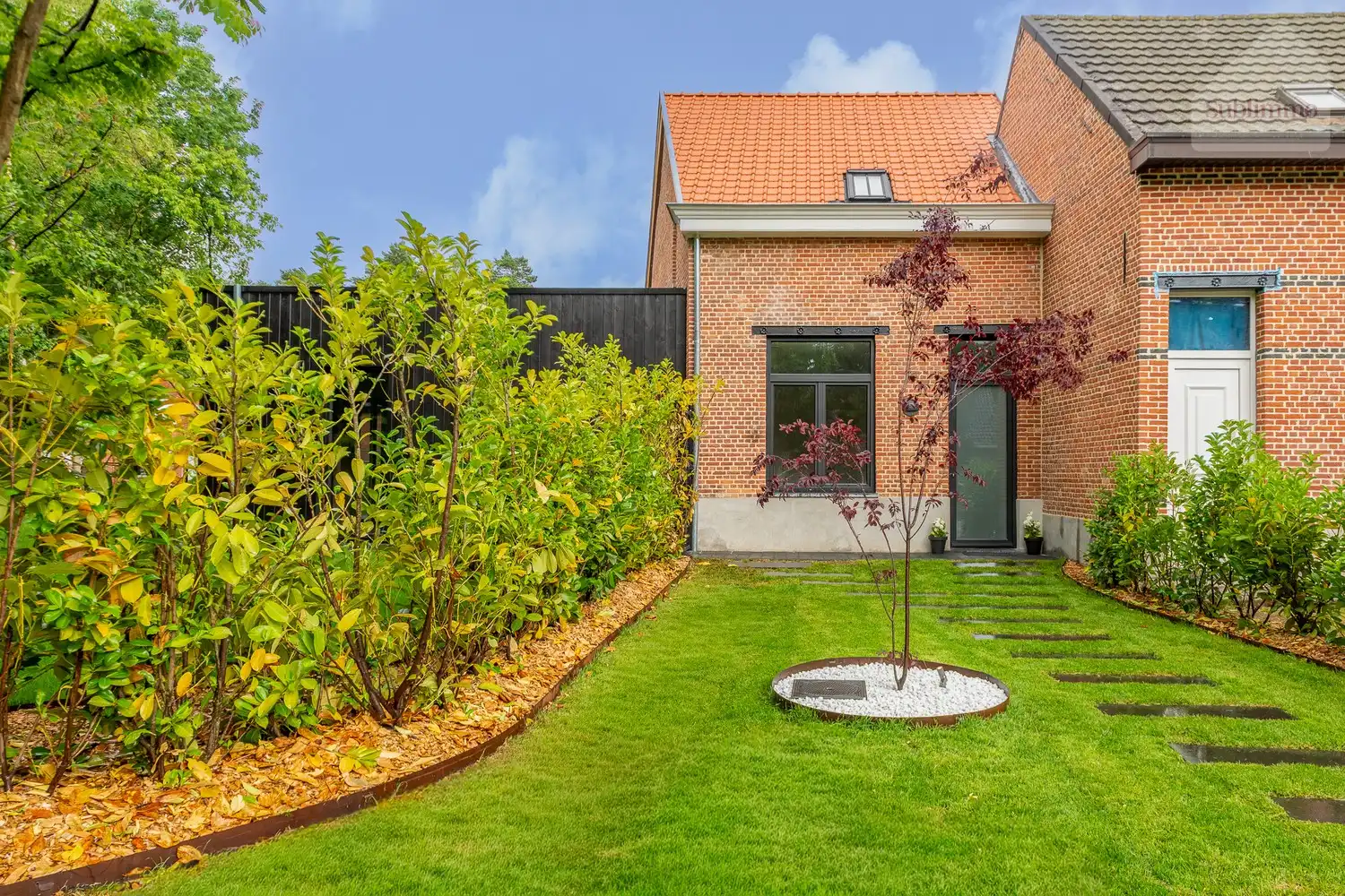 Volledig gerenoveerde karakterwoning met prachtige aangelegde tuin, polyvalente ruimte en 3 slaapkamers foto 3