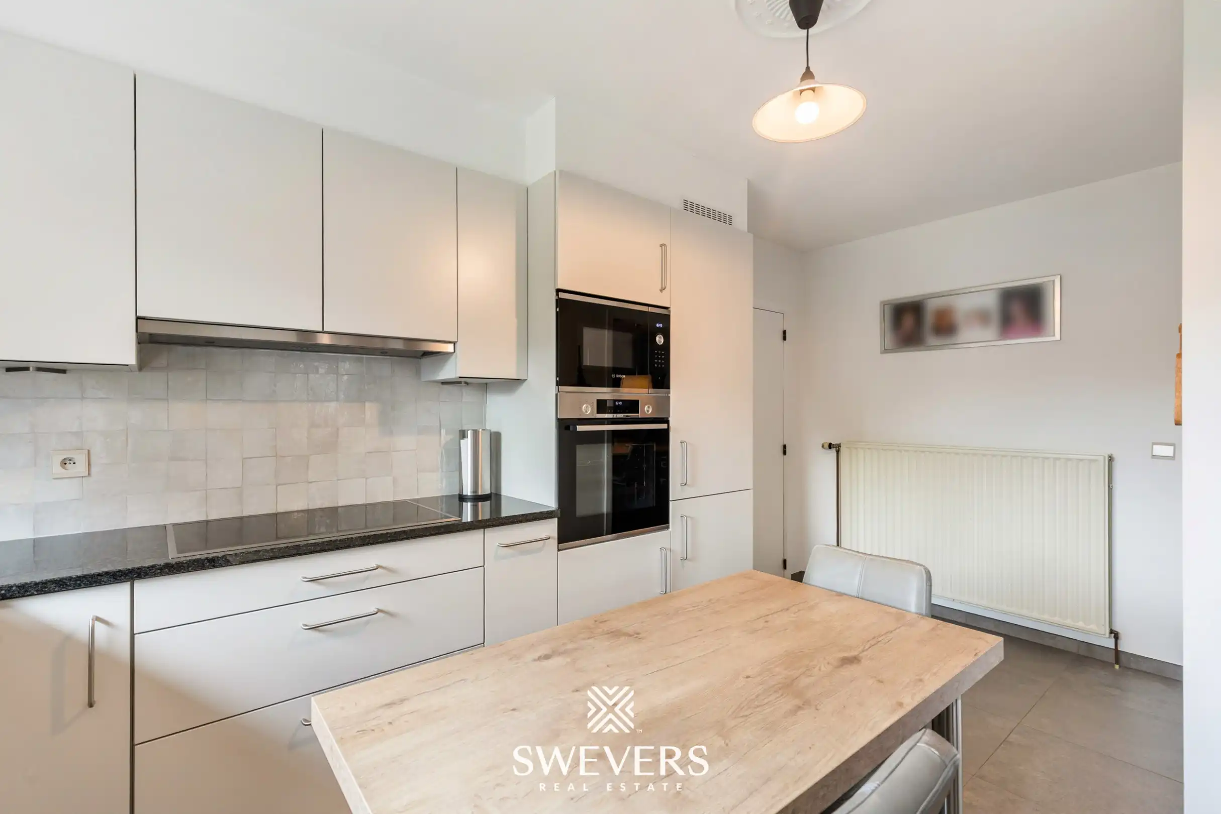 Uiterst verzorgde, gelijkvloerse woning (zolder met potentieel) te Heusden-Zolder foto 11