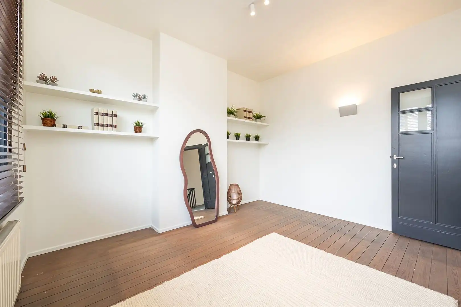 Instapklare herenwoning met privéparking, zonnepanelen en zuidgerichte patio foto 14
