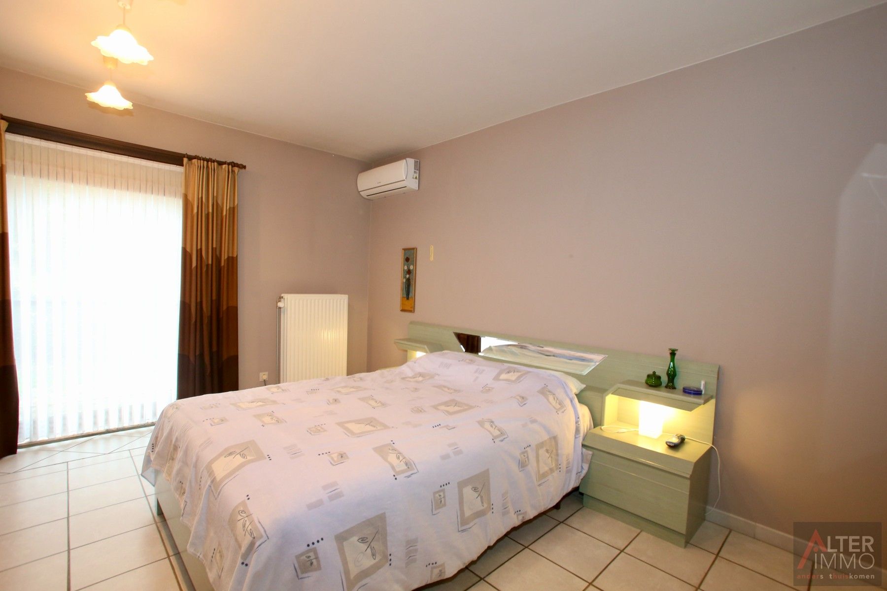 Ruime woning (205m2 NBO)  met 3 slaapkamers op een perceel van 24a 50ca! De woning is ingericht als "kangoeroewoning". foto 13