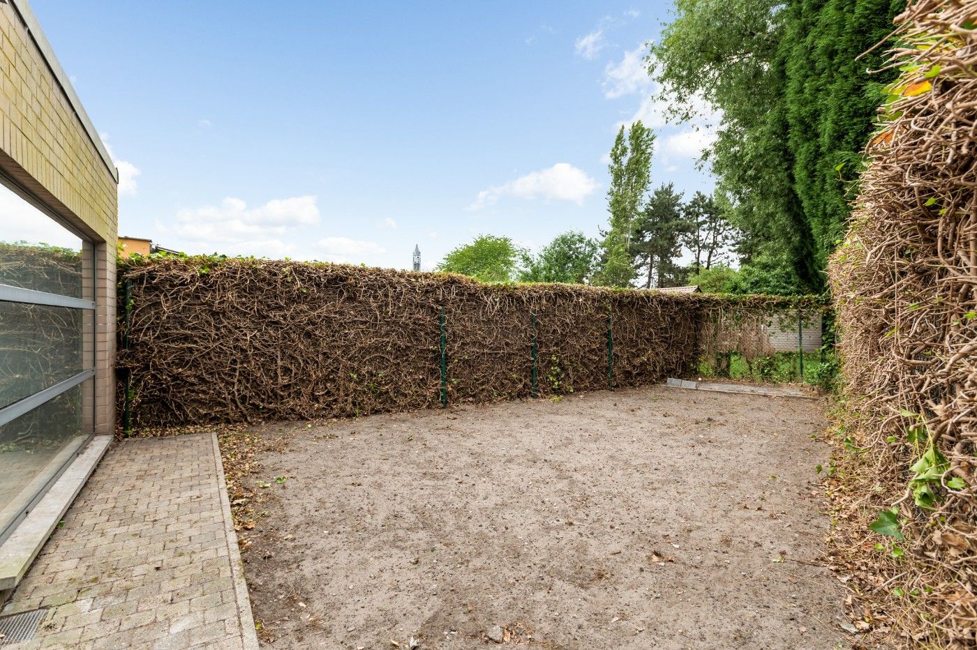 Ruime, instapklare woning met 3 slpk., dubbele garage en tuin foto 28