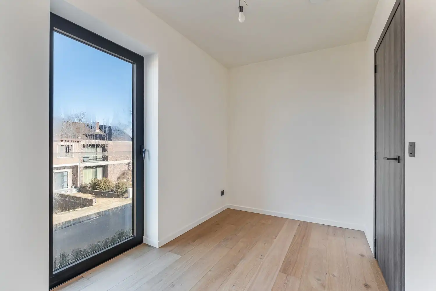 Instapklare nieuwbouw rijwoning met 3 slaapkamers en zonnig terras in het centrum van Borgloon foto 15