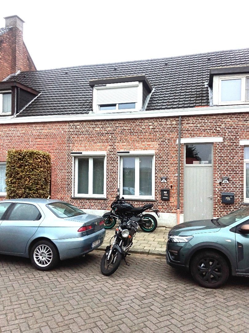 Centraal gelegen, knusse rijwoning foto {{pictureIndex}}