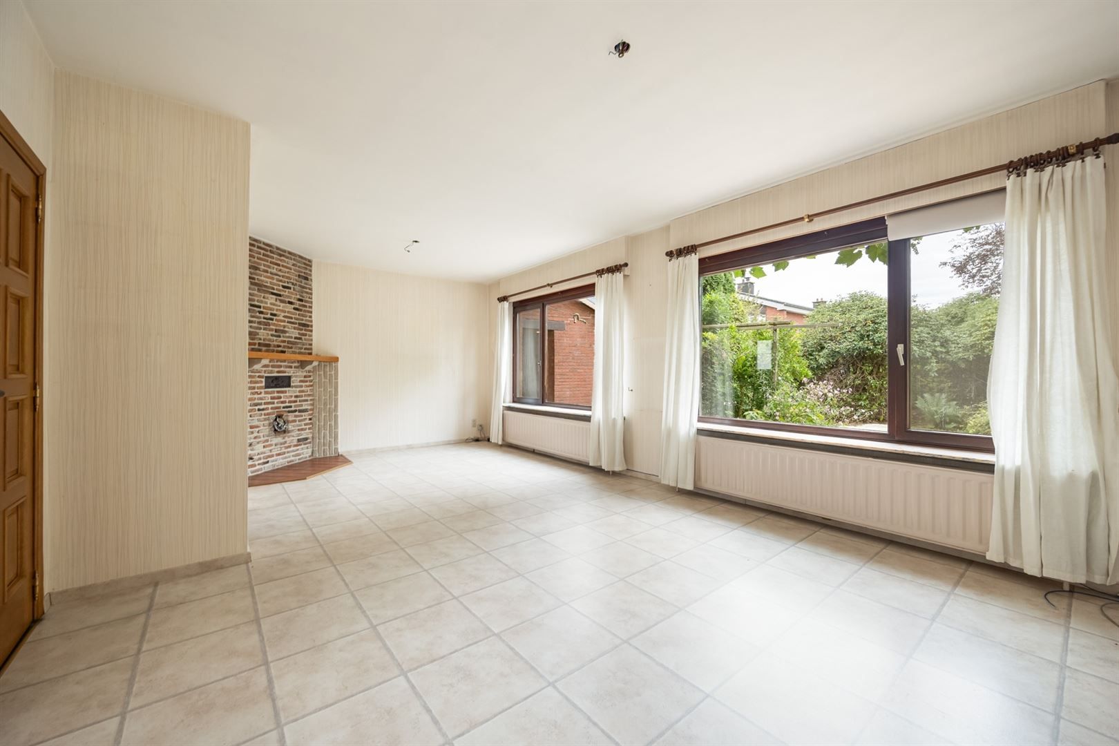 Halfopen woning met potentieel foto 6