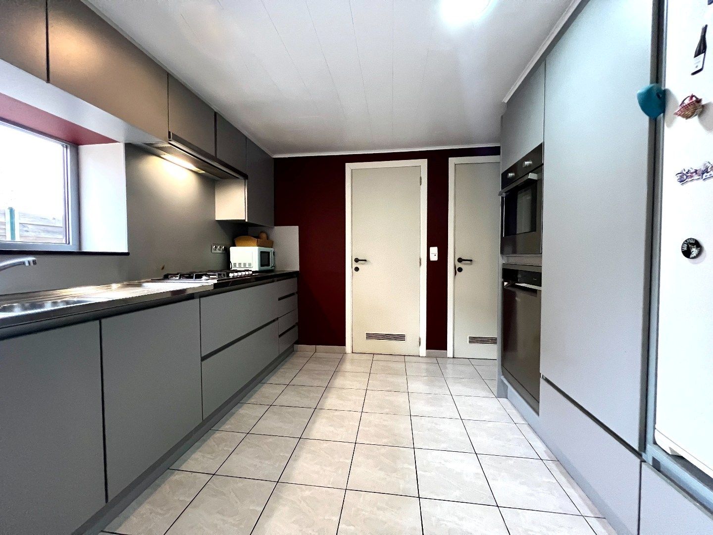 Charme troef in deze starterswoning te Wevelgem! foto 18