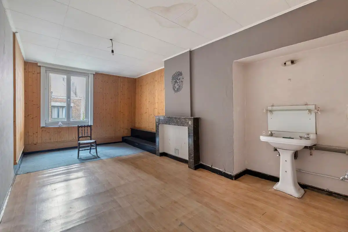 Opbrengsteigendom met renovatiepotentieel op toplocatie in Kortrijk foto 14