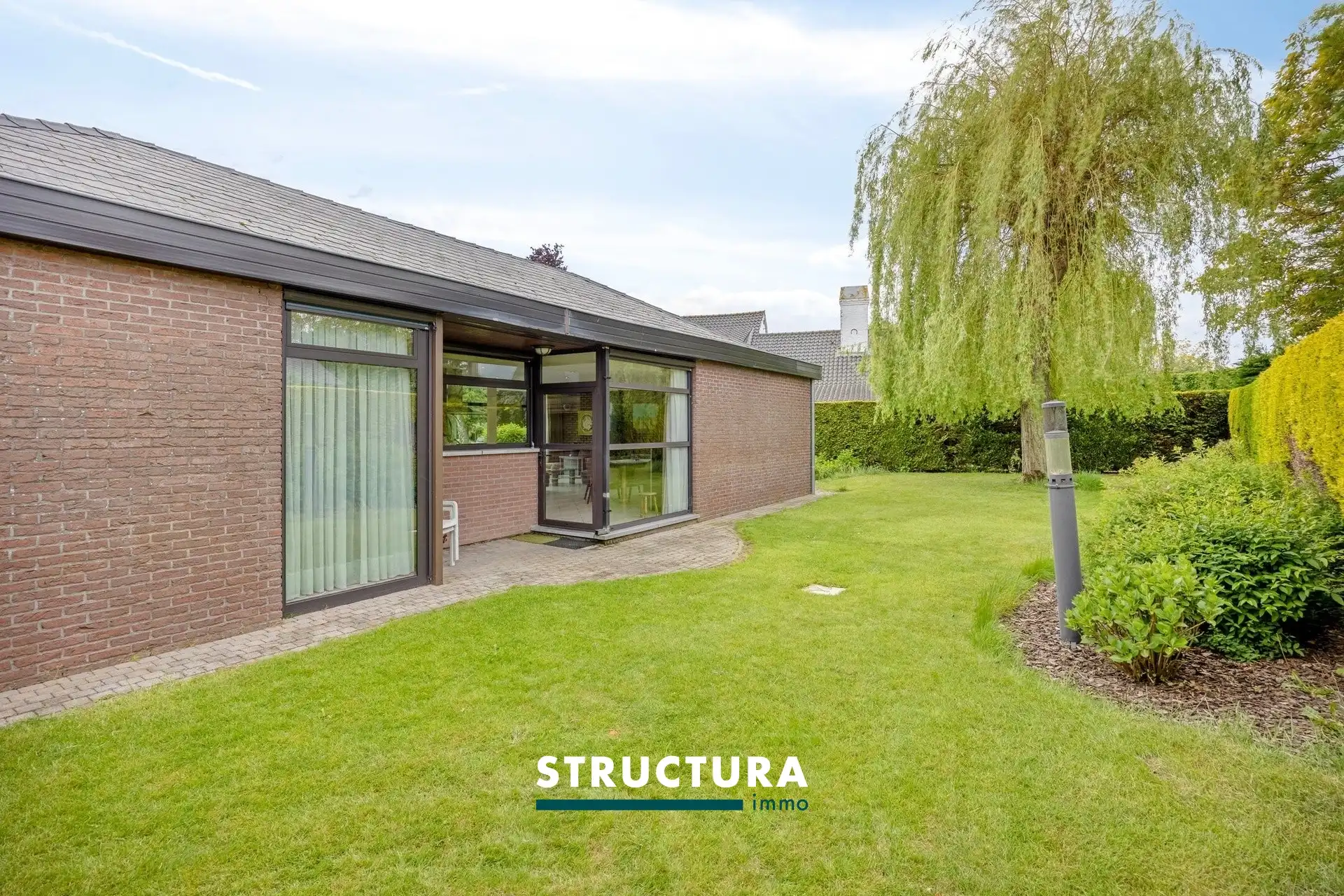 Gelijkvloerse woning met 3 kamers en westgerichte tuin foto 2