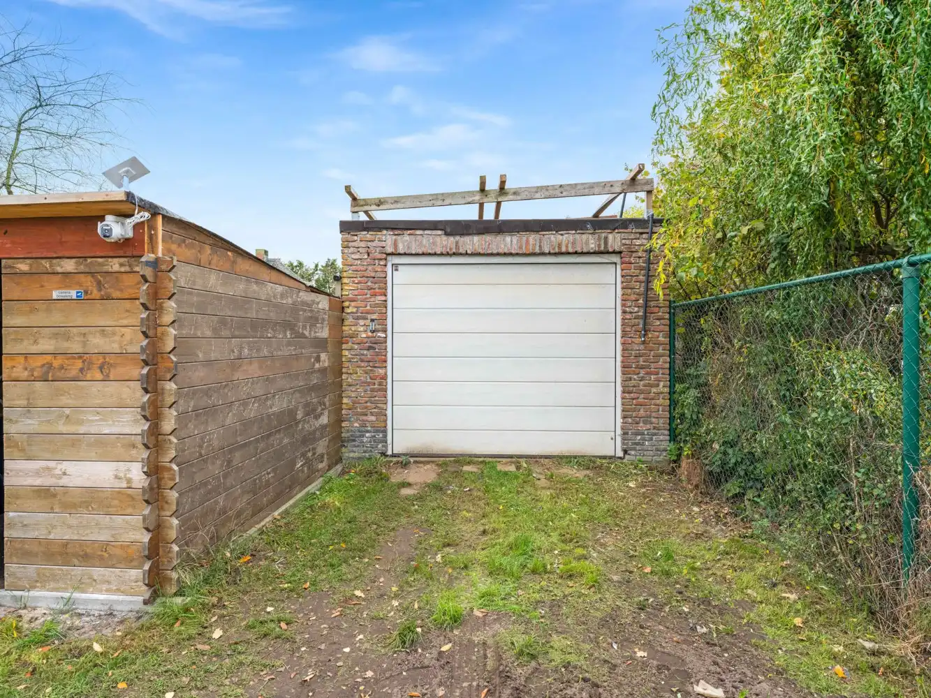 Instapklare woning met 2 slpk., garage en tuin foto 24