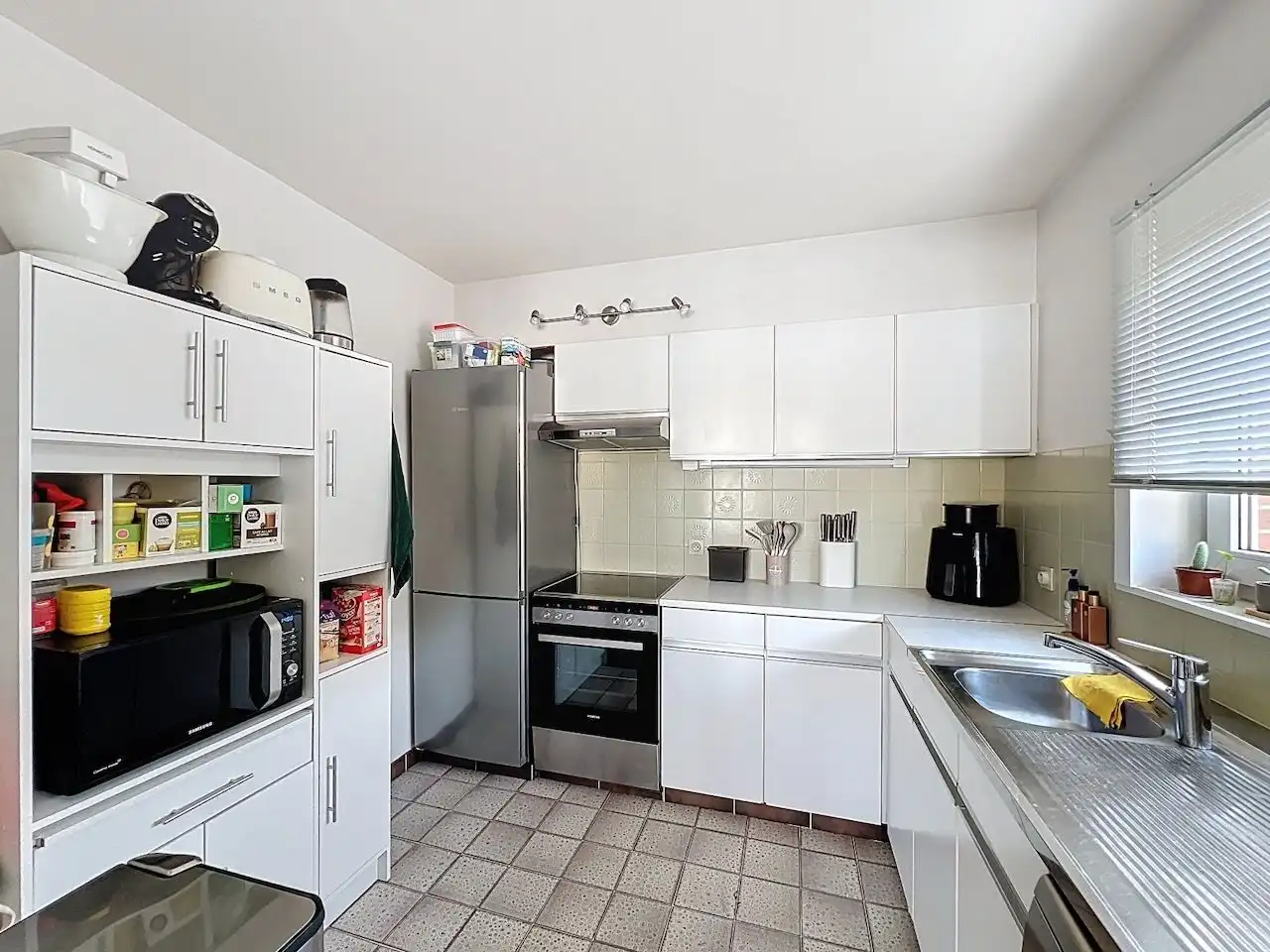 Mooi ingedeeld twee slaapkamerappartement in het hart van Heist. foto 11