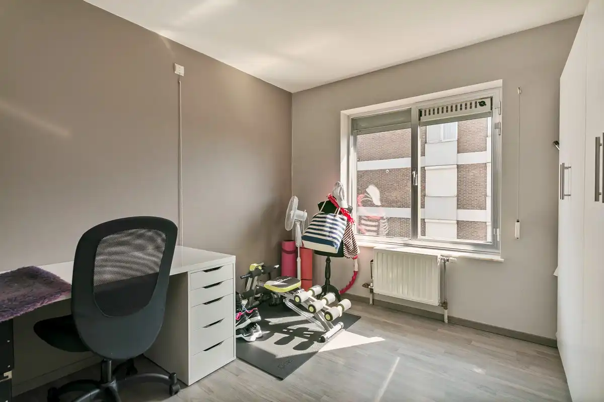 Appartement met twee slaapkamers en autostaanplaats in de ondergrondse garage in Rekem/Lanaken! foto 13