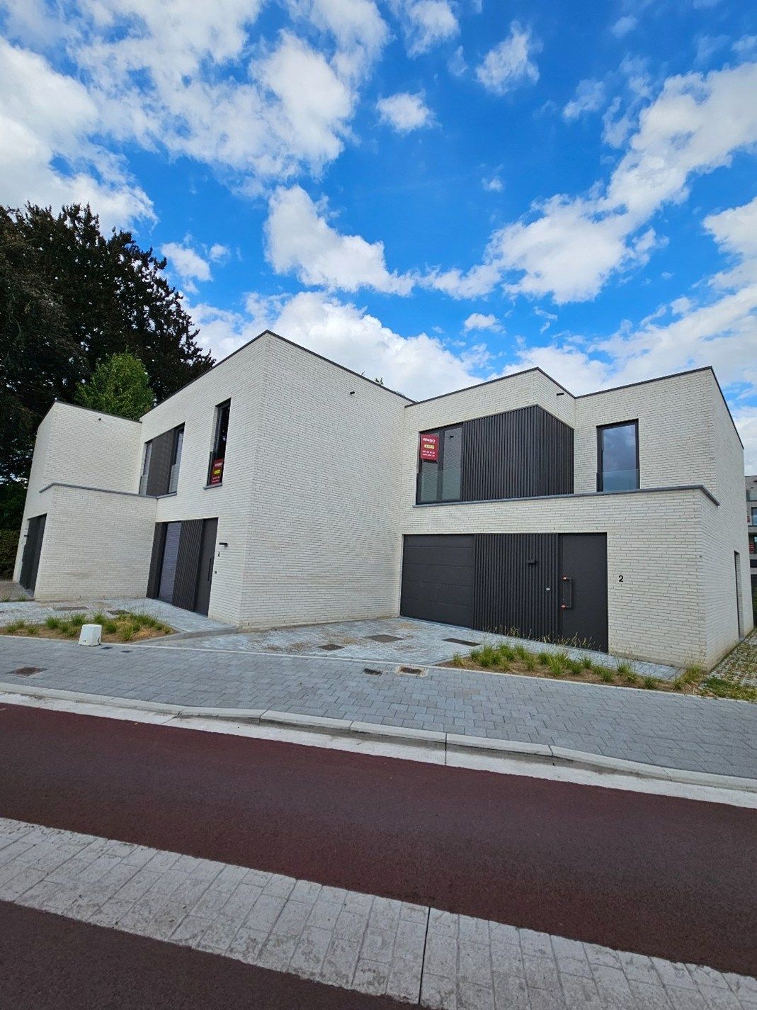 Instapklare nieuwbouwwoningen in hartje Harelbeke foto {{pictureIndex}}