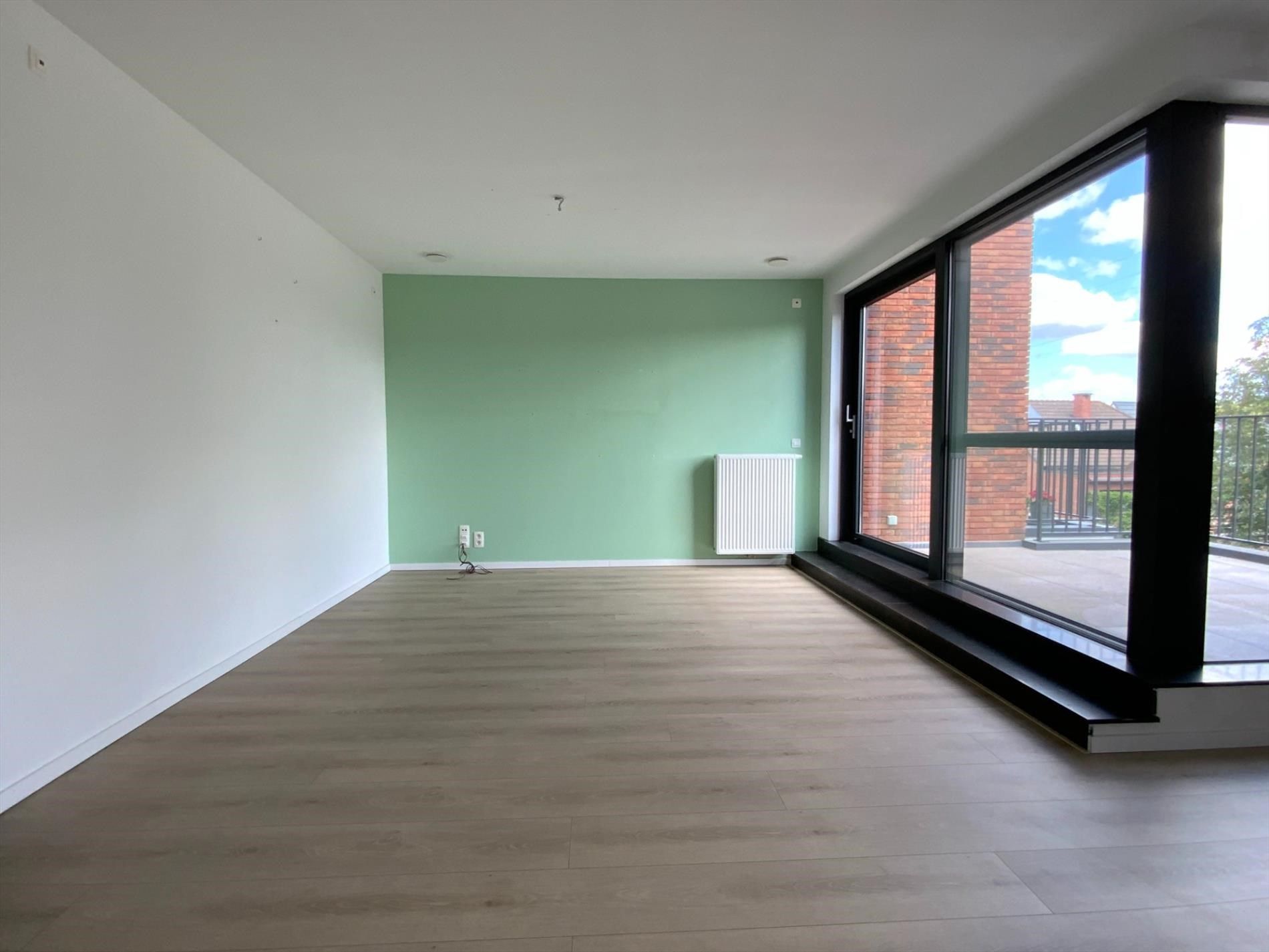 Hedendaags 2 slpk appartement met lift, terras en parking foto 3