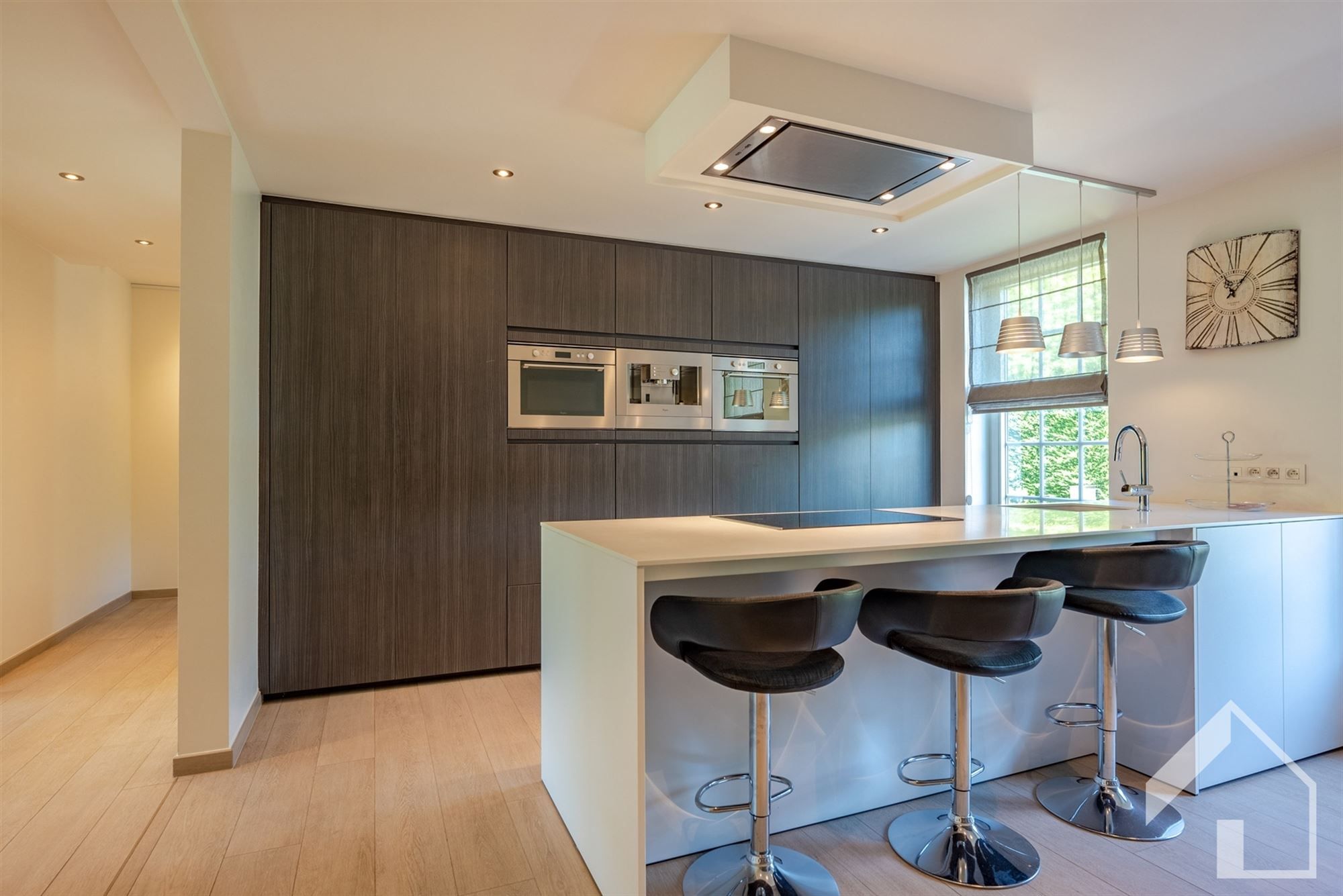Energiezuinige woning met lift, tuin, oprit en inpandige garage foto 5