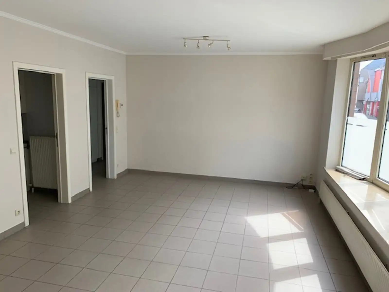 Gelijkvloers 1 slaapkamerappartement foto 2