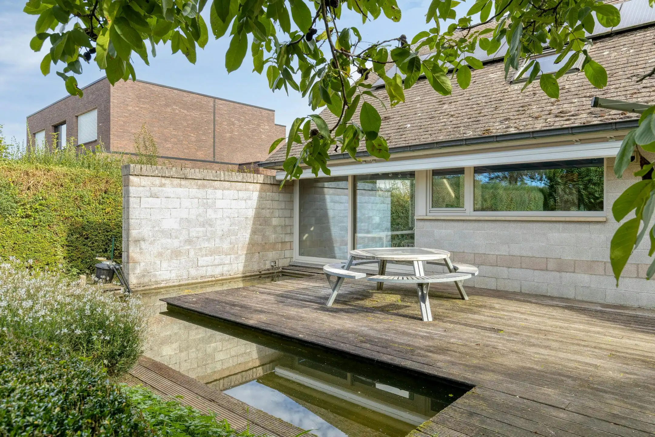 Uniek, lichtrijk huis te koop met speelse tussenniveaus  foto 12
