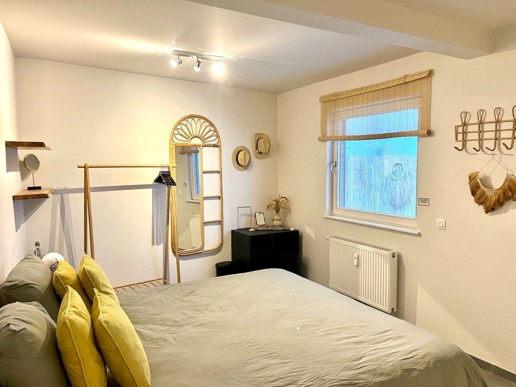 Stijlvol gemeubeld appartement met zeer groot terras en 2 slaapkamers foto 11