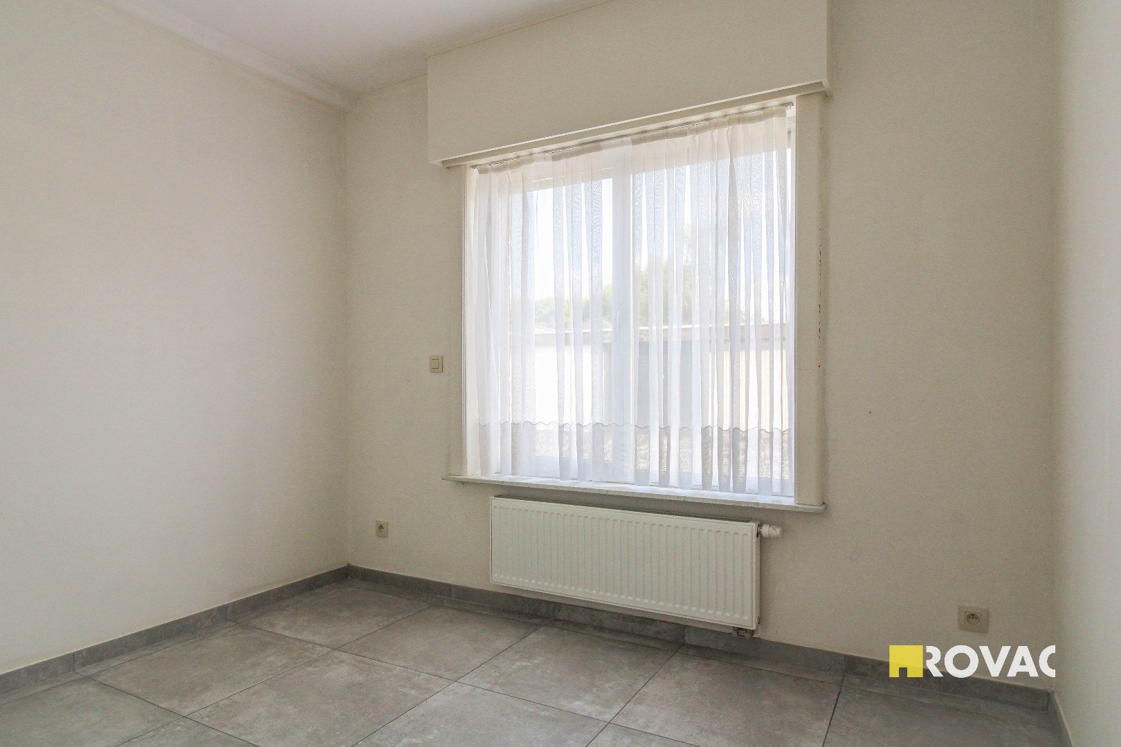 Volledig gerenoveerd appartement op het gelijkvloers - in zeer rustige omgeving! foto 9