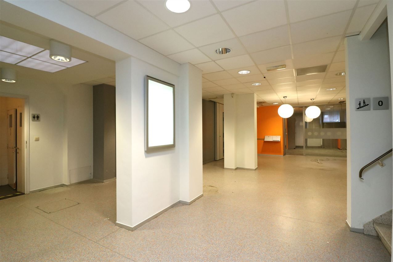 Opbrengsteigendom (handel & 4 app) op toplocatie foto 7