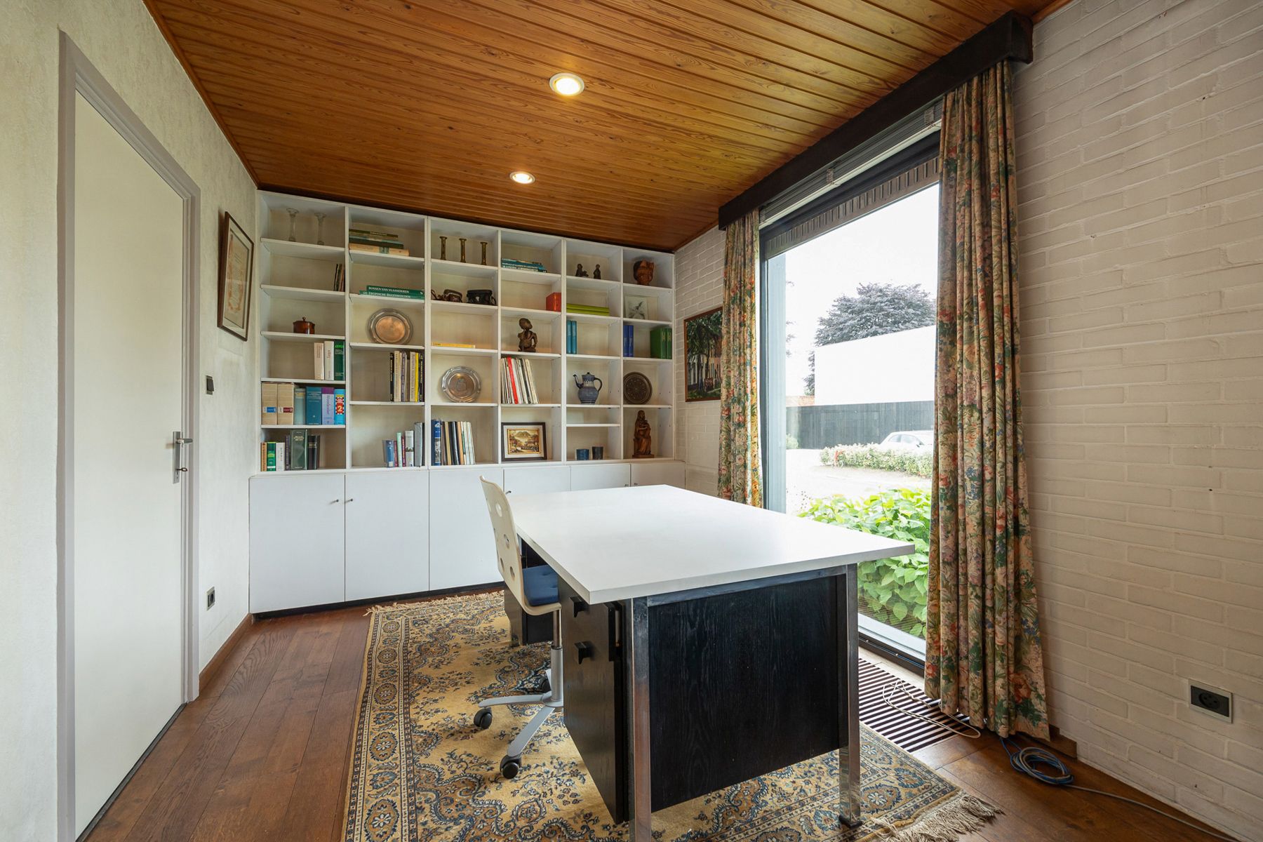 Laagbouwwoning met inpandige garage op een perceel van 561 m² in het centrum van Minderhout. foto 4