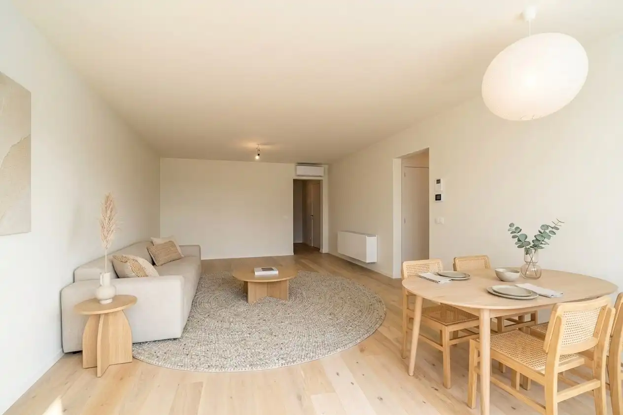 Totaal gerenoveerd appartement met open zicht en uitzonderlijke terrassen op topligging in Heist. foto 8