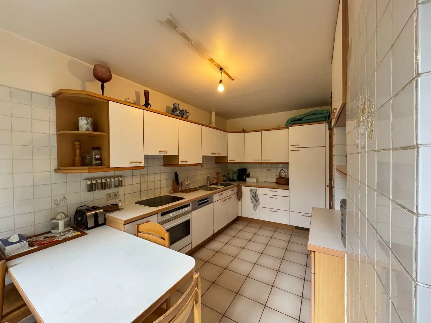 Charmante 3-gevelwoning met garage en tuin foto 3