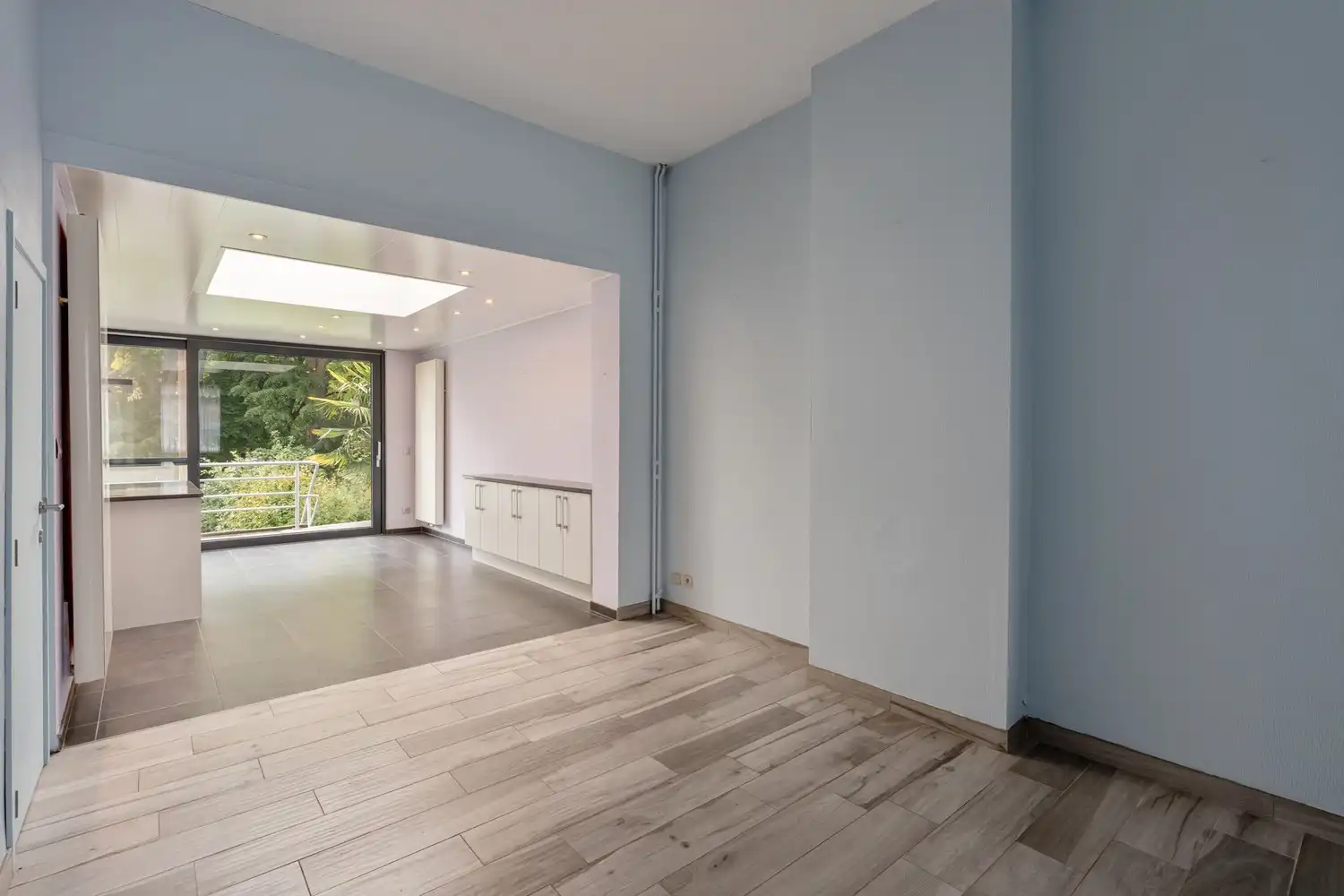 Gerenoveerde en energiezuinige woning met 4 slaapkamers en een tuin grenzend aan het Mariapark te Leuven! foto 4