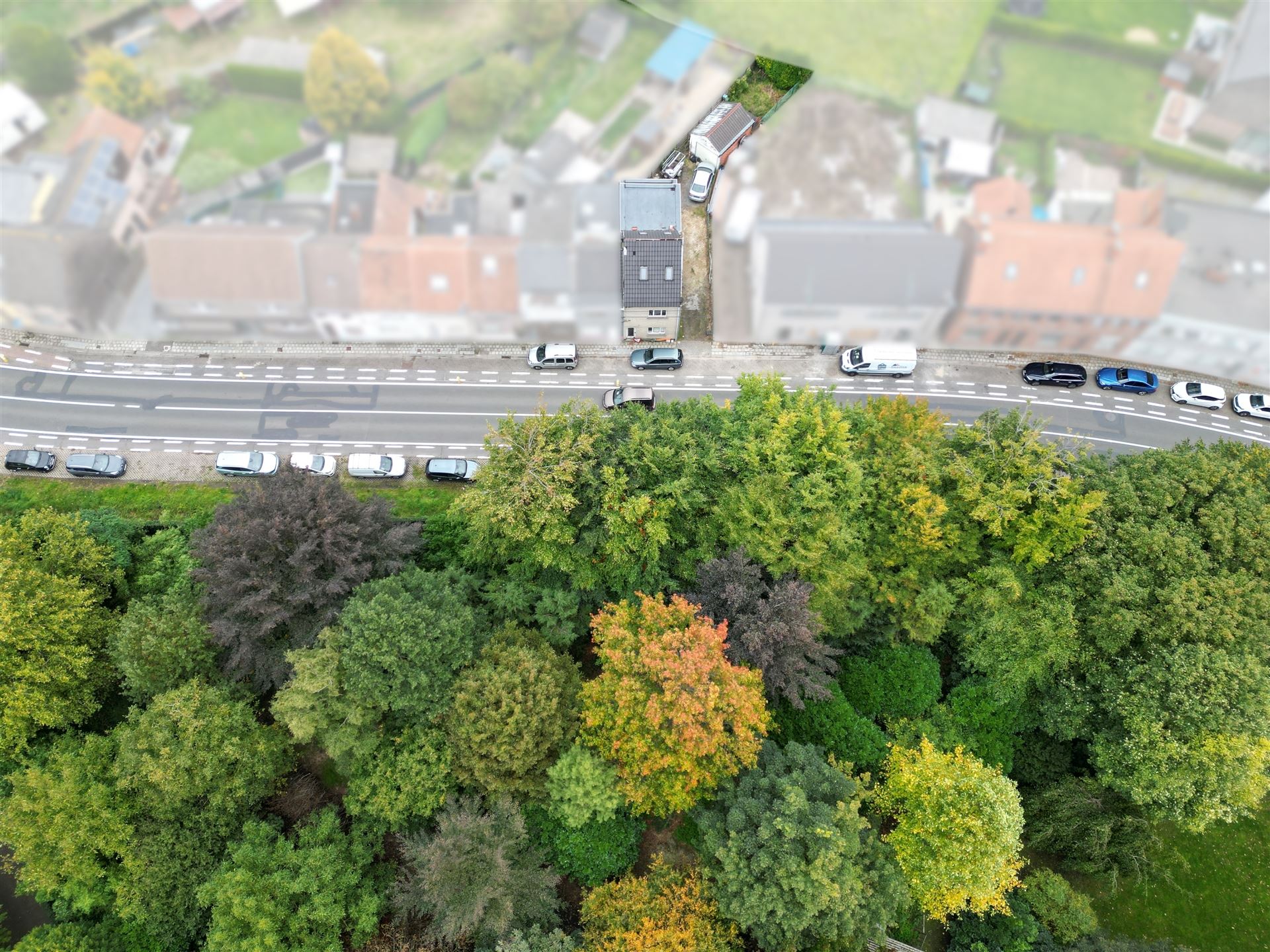 Te renoveren woning met tuin en garage nabij Gent! foto 2