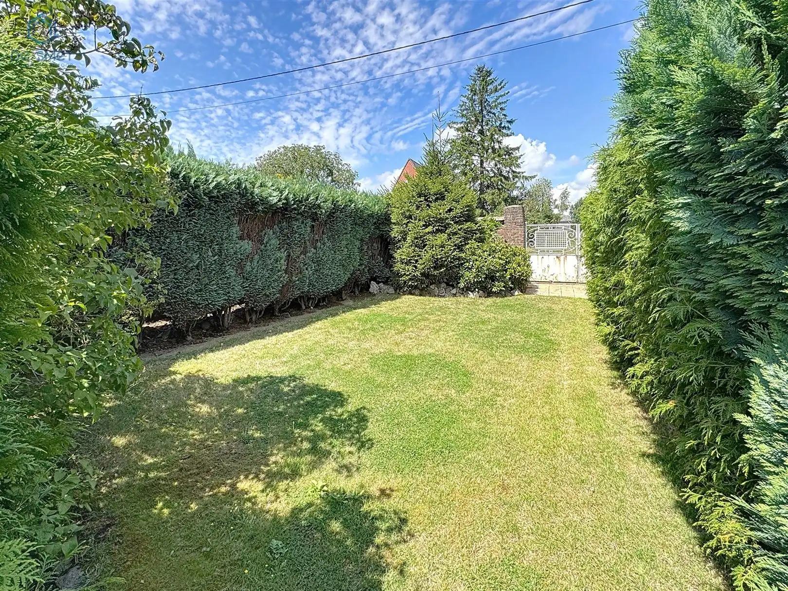 Te renoveren woning met 4 slpks, garage & prachtige tuin vlak aan station Lierde foto 3