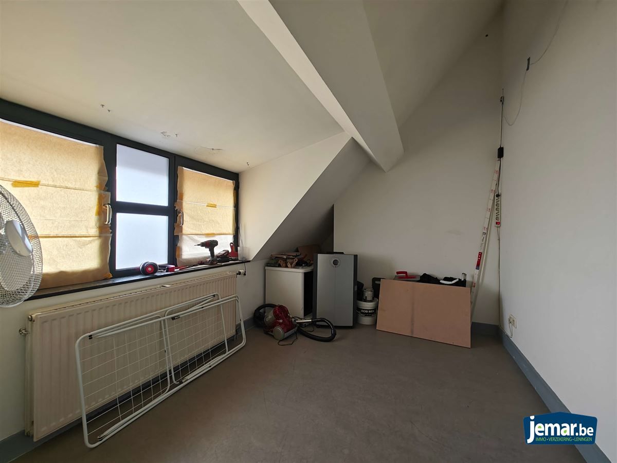 AANDELENOVERDRACHT: Handelspand met appartement foto 27