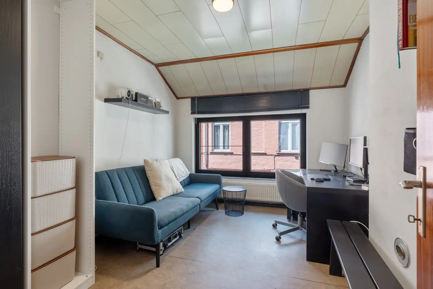 Rustig gelegen woning met 2 slaapkamers en een koer nabij het station te centrum Leuven! foto 11