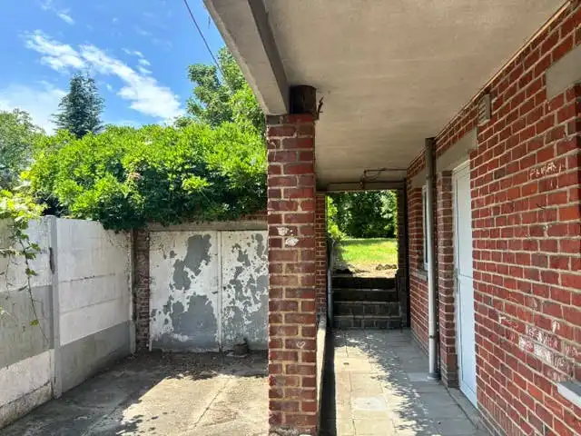 Te renoveren halfopen bebouwing te koop in Lotenhulle foto 18