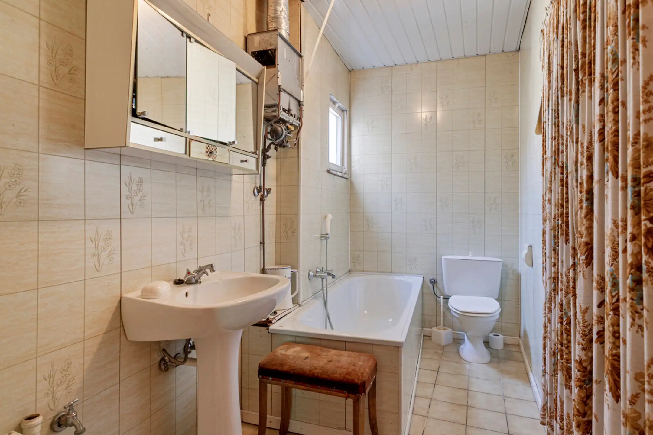 Eigendom met appartement én handelszaak met woonst & garage! foto 12