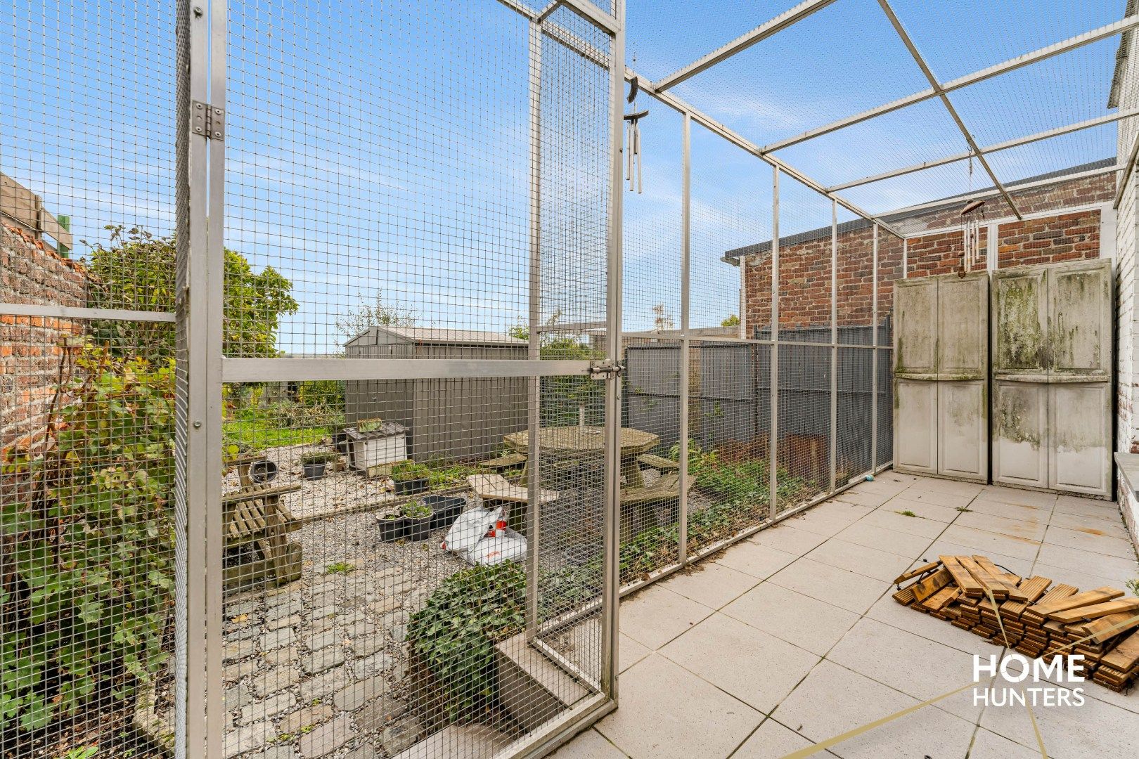 Op te frissen woning met charmante tuin in het hart van Mesen foto 18
