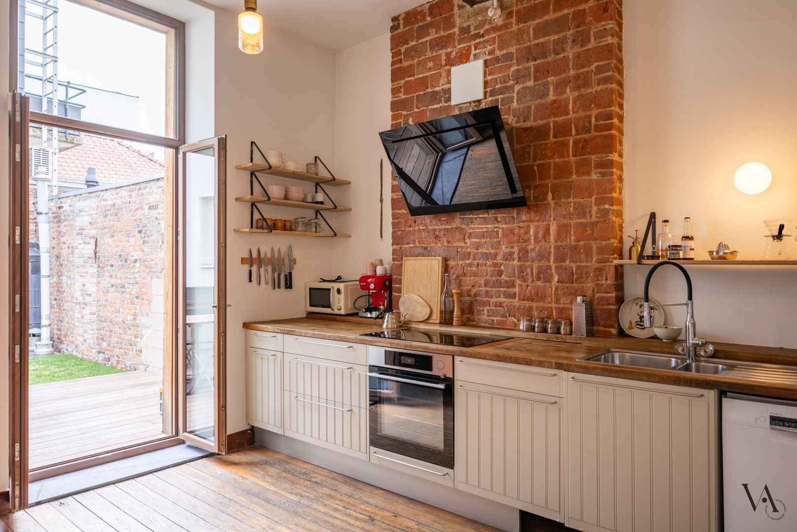 Gerenoveerd duplex appartement in historisch pand foto 3