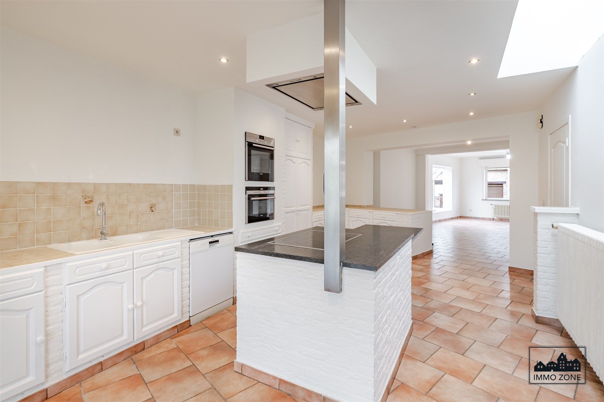 Lichtrijke halfopen woning te Nieuwerkerken! foto 4