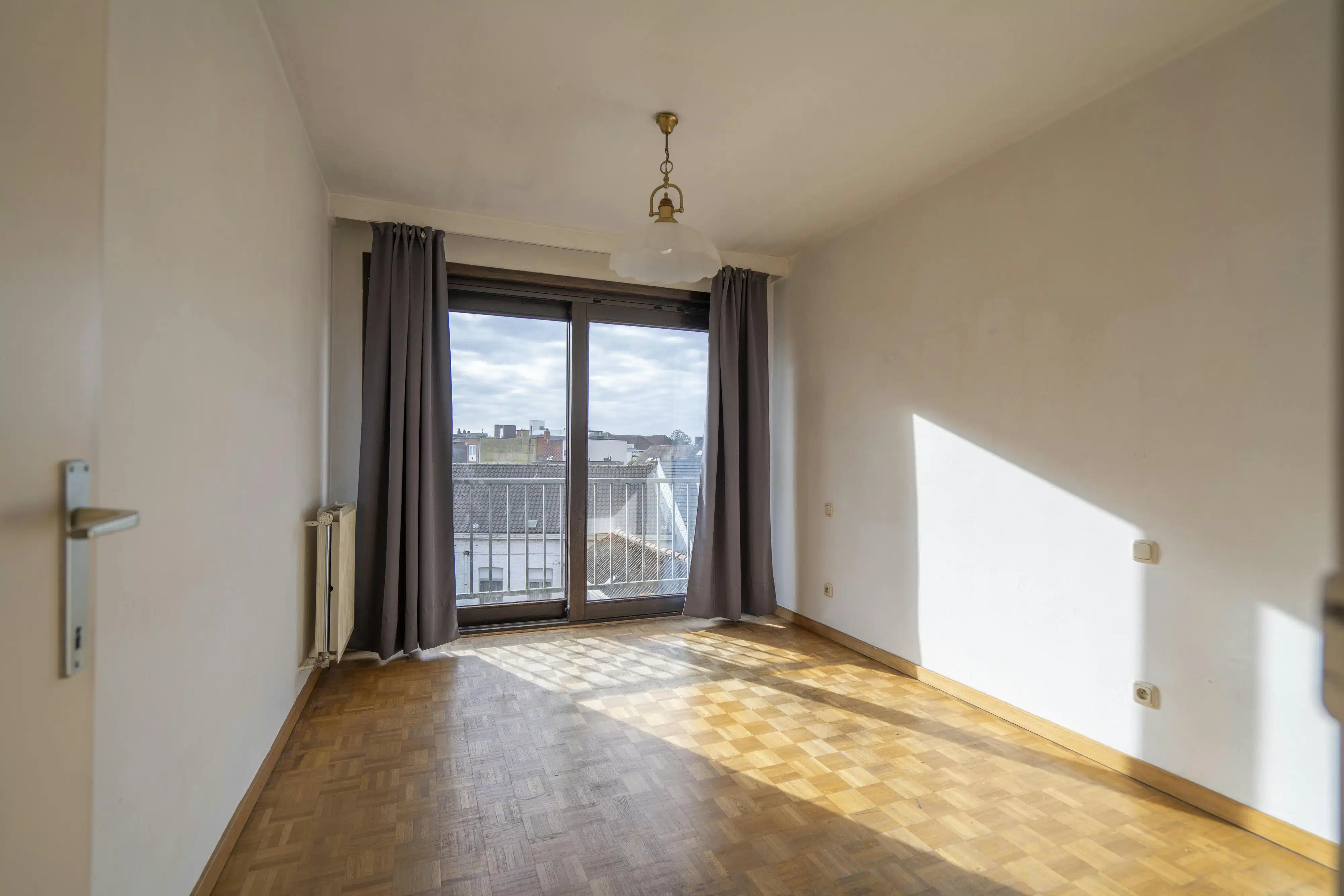 Te koop: lichtrijk 2-slaapkamerappartement in Kortrijk foto 13