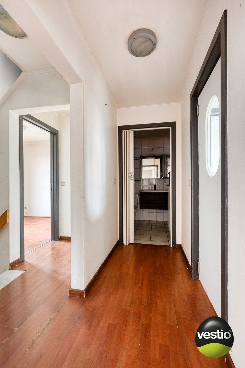 Handelspand met woonst / projectopportuniteit aan de Luikersteenweg. foto 10