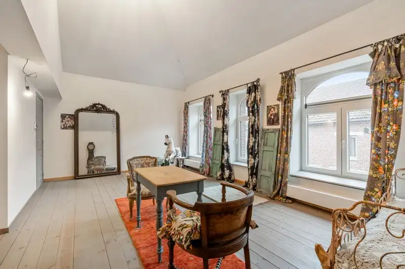 Handelsruimte met woonappartement in het centrum van Wommersom foto 8