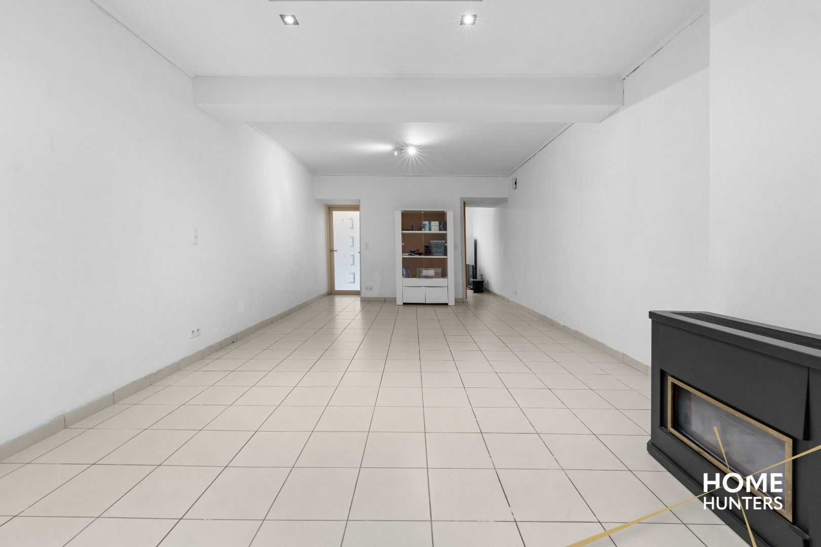 Charmante, op te frissen rijwoning met ruime tuin en 3 slaapkamers foto 6