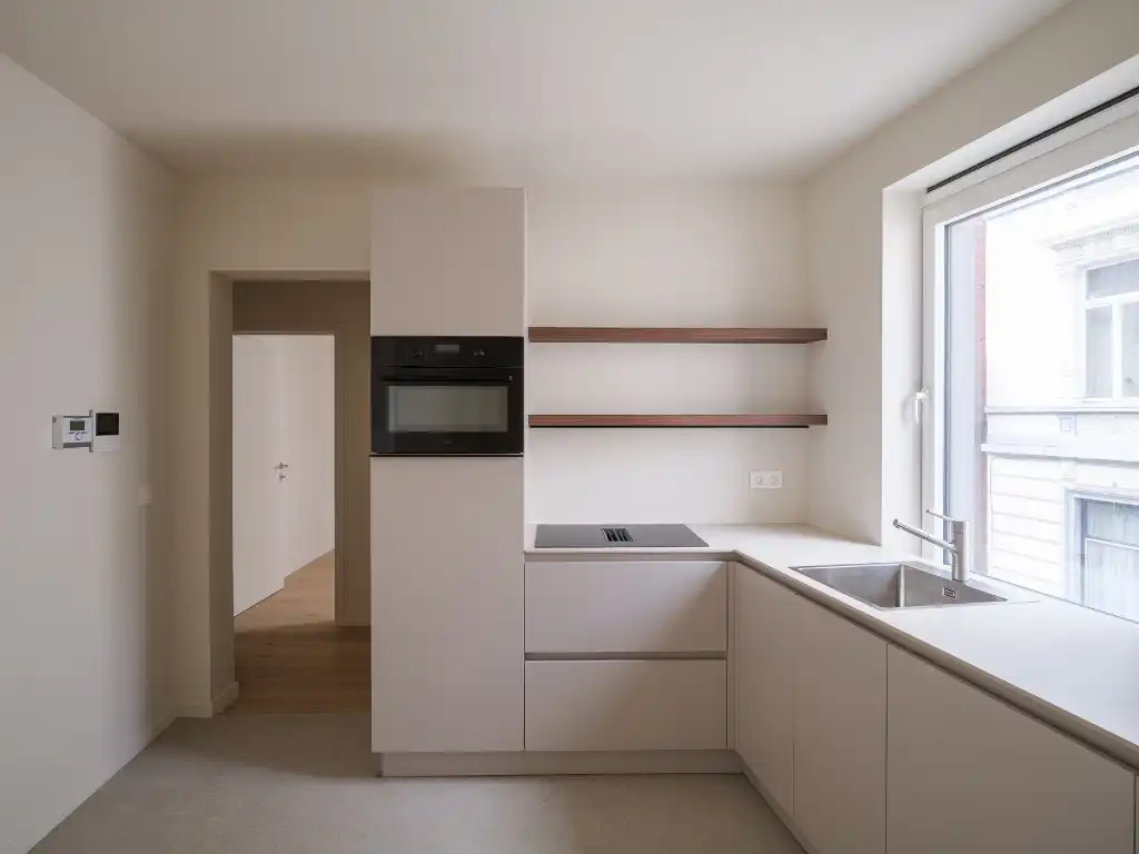 Hoogwaardig gerenoveerd duplex appartement met zonnig terras in het centrum van Gent foto 2