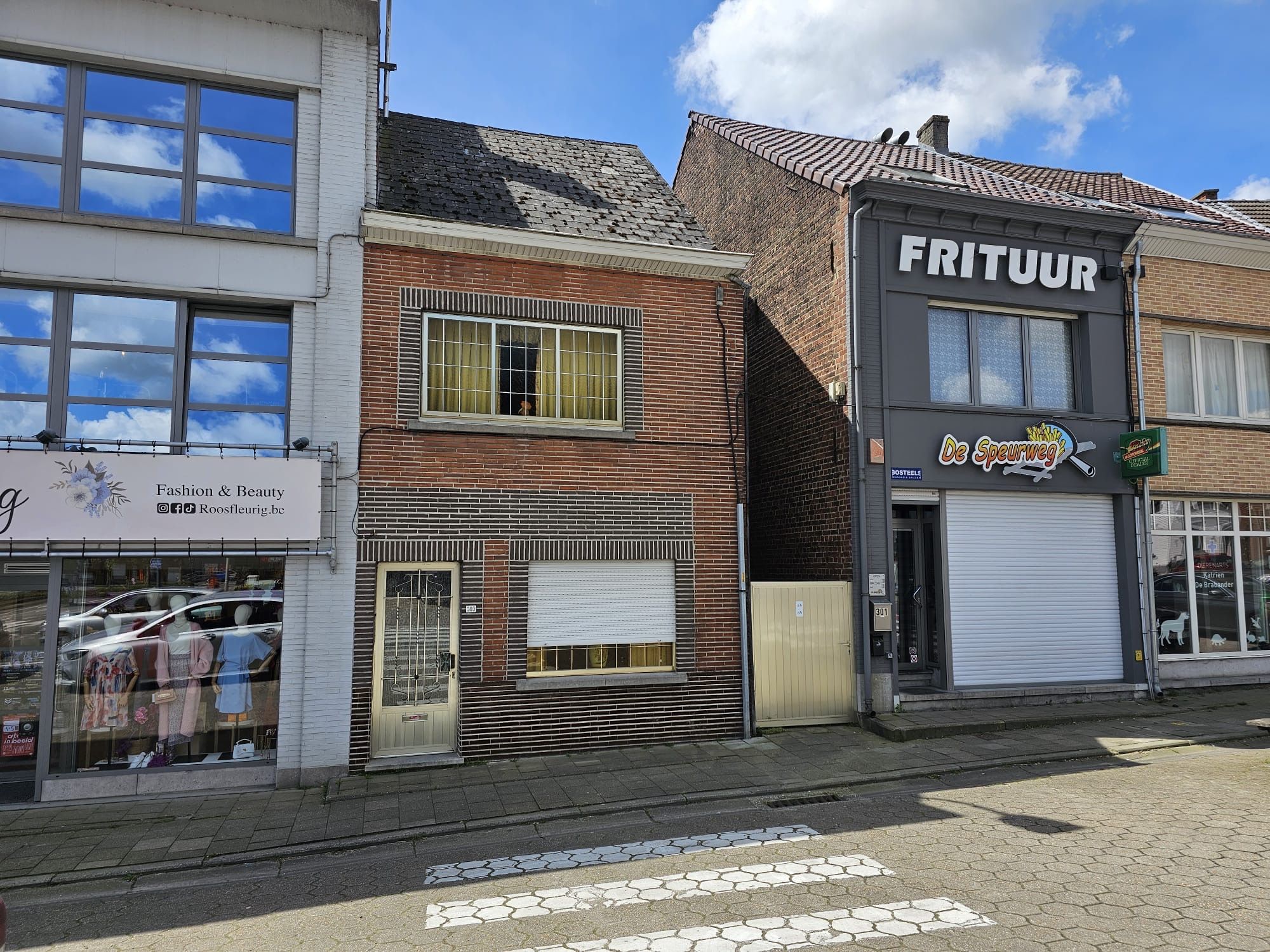 Te renoveren woning met tuin in het centrum van Moerbeke foto 2