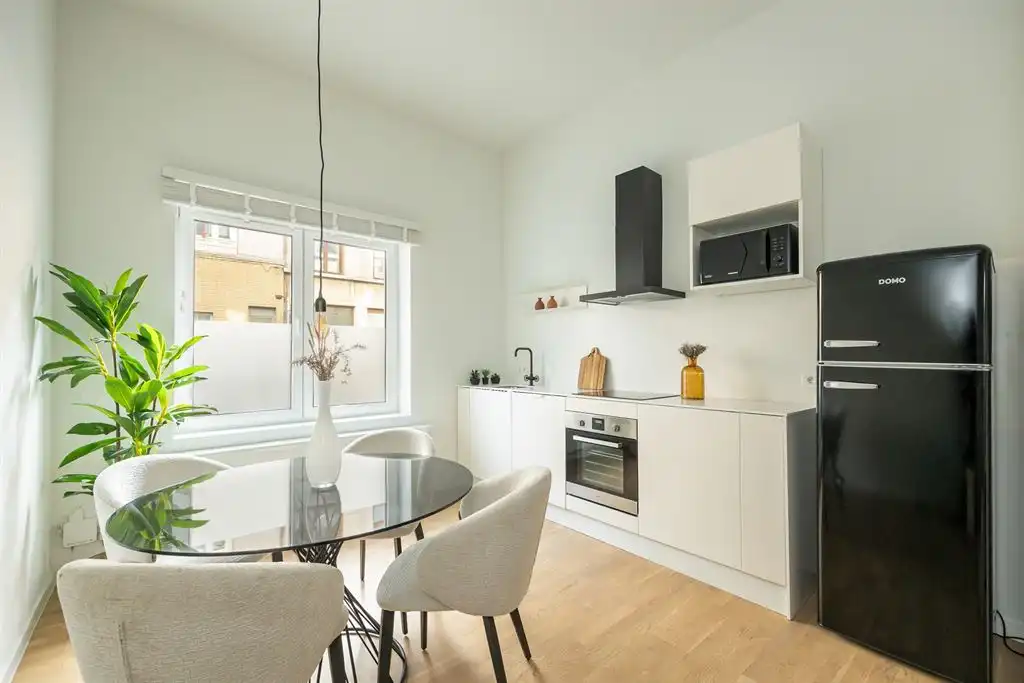 Gerenoveerd gelijkvloers appartement met stadstuin foto 2