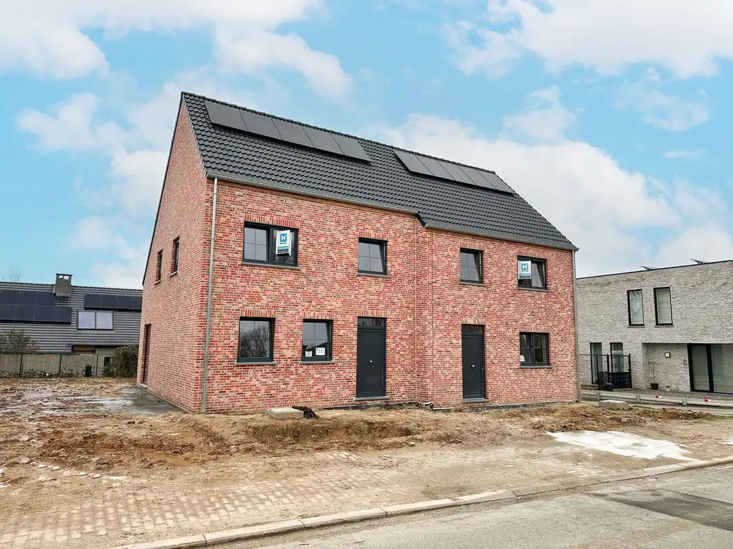 Hectaar bouwt energiezuinige nieuwbouwwoningen te Gooik foto {{pictureIndex}}