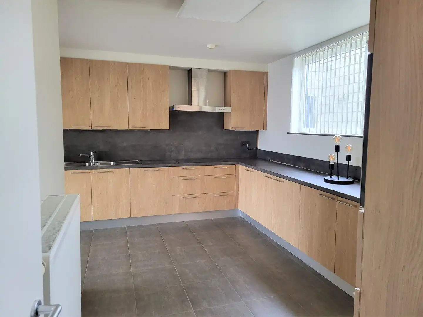 Lichtrijk en energiezuinig duplex appartement met ruim terras foto {{pictureIndex}}