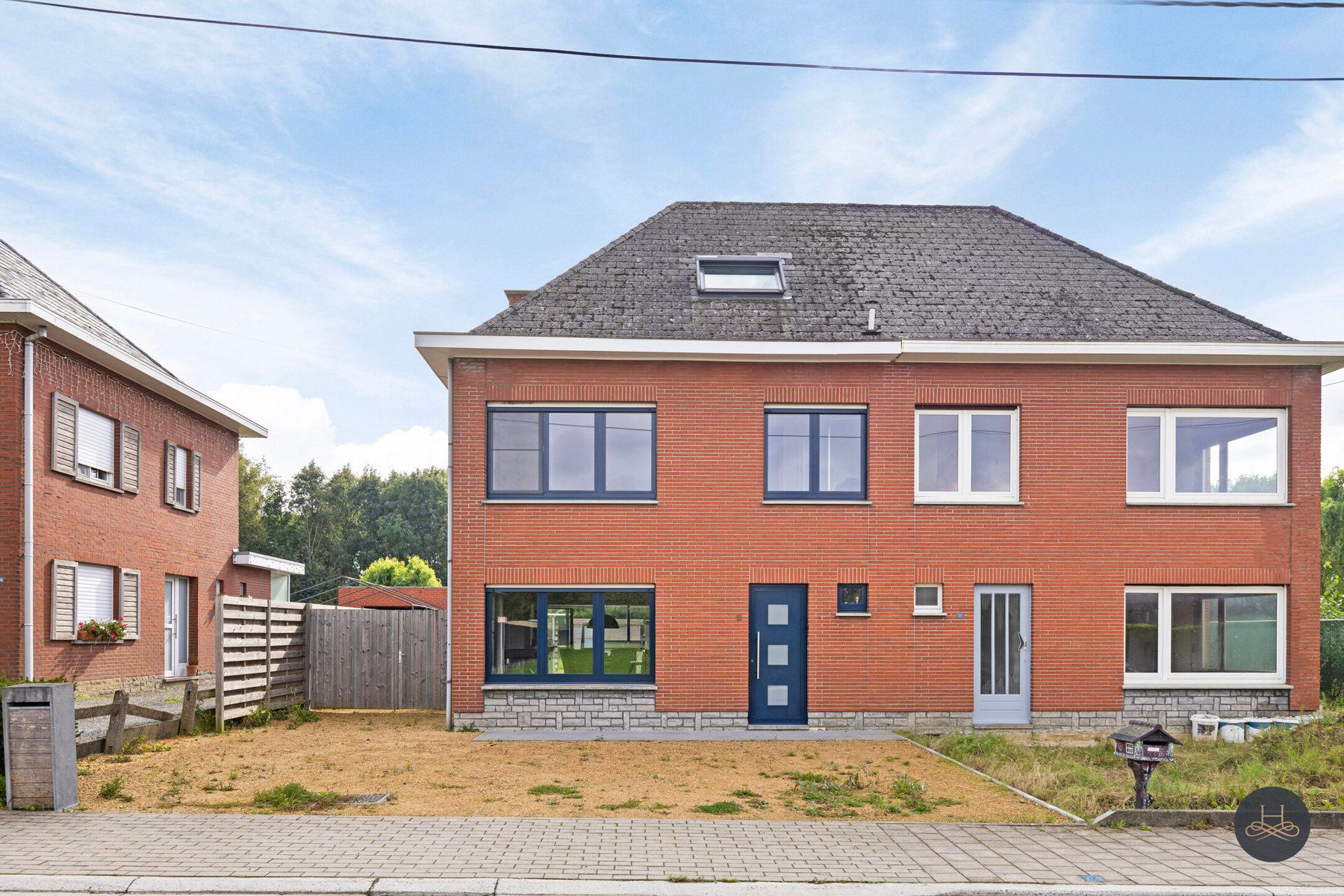 Instapklare halfopen woning in een rustige straat  foto 2