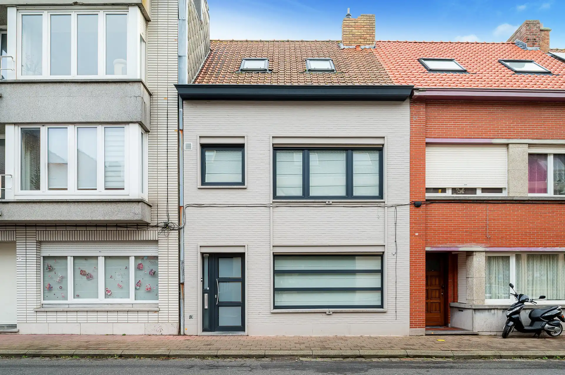 Instapklare woning met zonnige tuin in het centrum van Heist foto {{pictureIndex}}