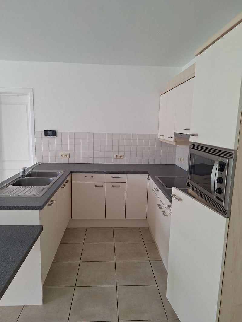Knap opgefrist gelijkvloers appartement te Paal foto 8
