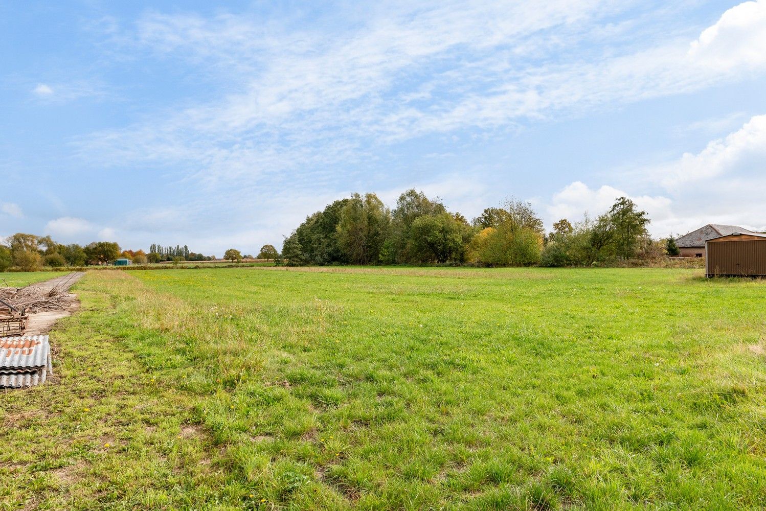 Ruime open bebouwing met loods en garages op ca. 1,7 ha – landelijke ligging in agrarisch gebied. foto 32